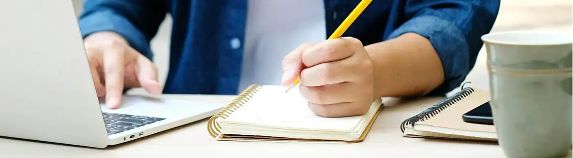 Hand writing in a notebook