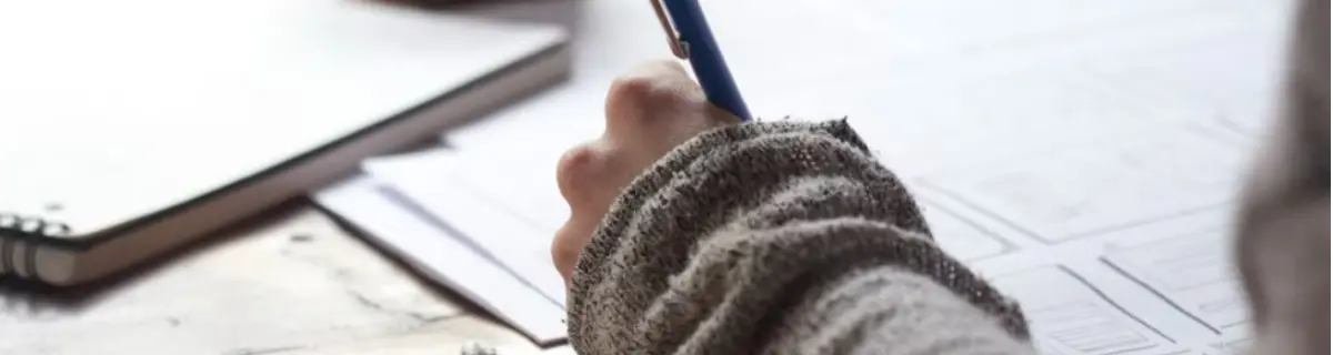 Hand writing in a notebook