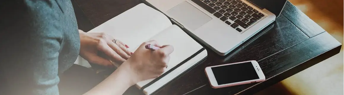 Hand writing in a notebook