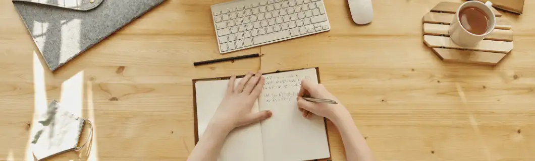 Hand writing in a notebook