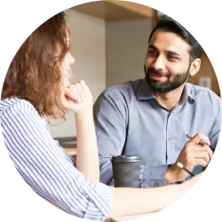Non-native English speaking student receiving academic writing guidance